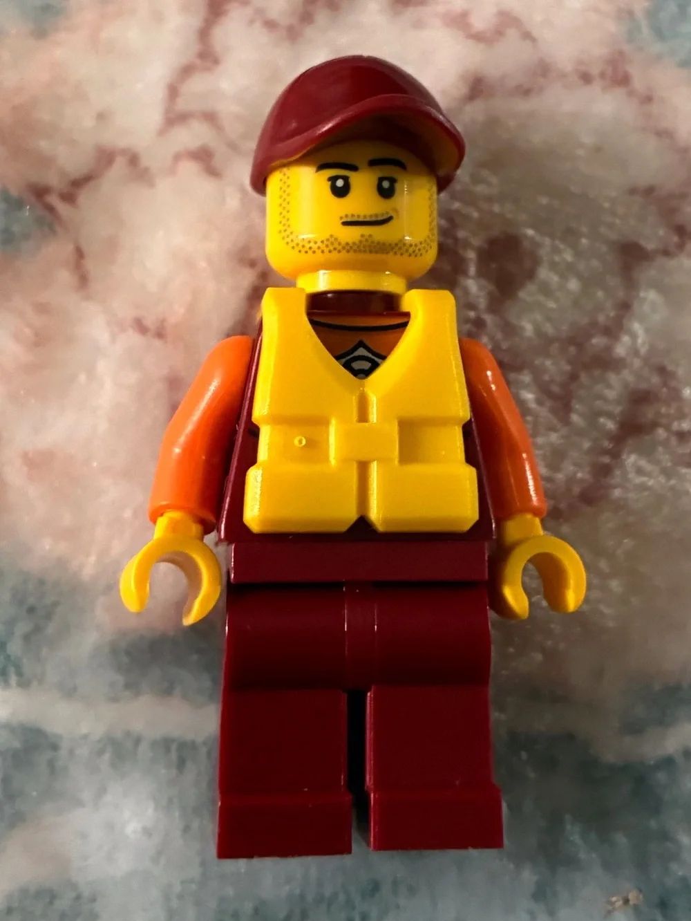 Lego Yellow Life Vest Minifigure with Red Cap and Maroon Legs